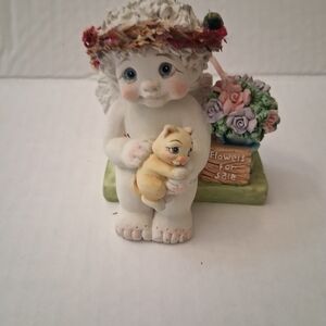 Dreamsicles cherub figurine, likely titled "Where Love Grows" from 1998.